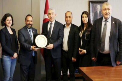 GBC Başkanı Kurt’tan Karaduman’a plaket