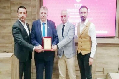Enver Bal'a teşekkür plaketi