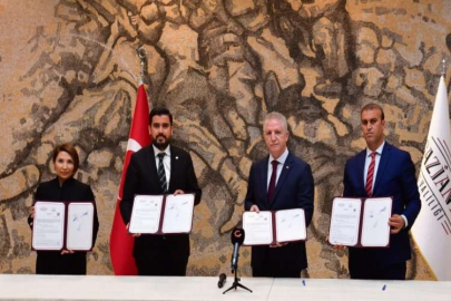 AY AİLESİ’NDEN 2 OKUL