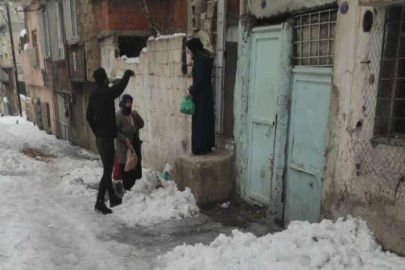 Soğuk kış günlerinde yaşlılara yürekleri ısıtan destek