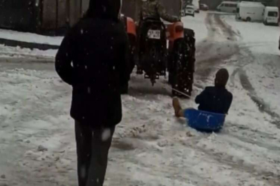 Leğenle snowboard yaptı