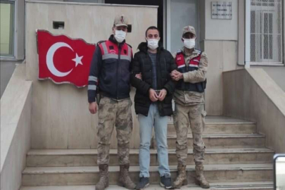 Cinayet zanlısı saman çuvallarının arasında yakalandı
