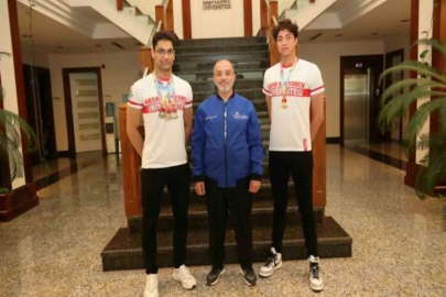 HKÜ’lü milli sporculardan yüzmede çifte başarı