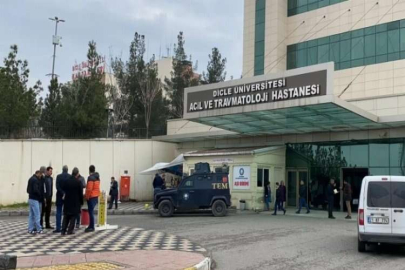 Ailesinin komşusuyla olan kavgasını ayıran polis silahla vuruldu