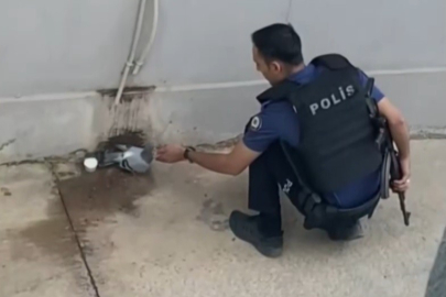 Sıcaktan bunalan güvercine polisten yardım eli