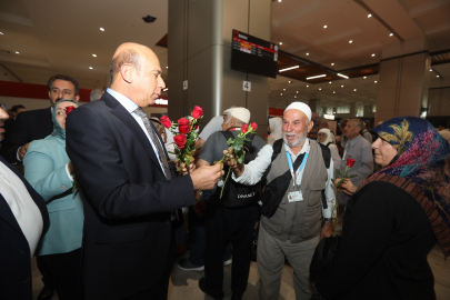 KUTSAL TOPRAKLARDAN DÖNDÜLER