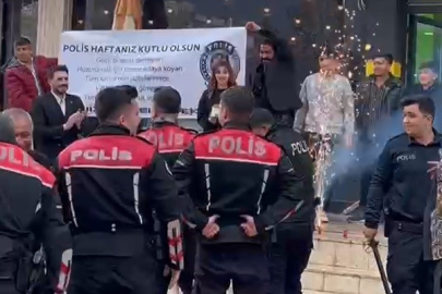 Kavga ihbarına gelen polisleri pankart ve pasta ile karşıladılar